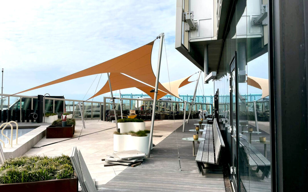 Stormproof hotel patio cover at the beach for Inntel Hotels